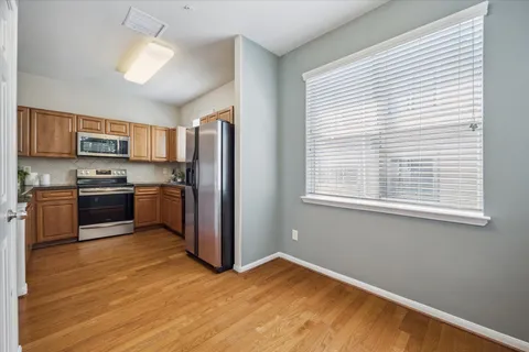 a bathroom with a shower and toilet