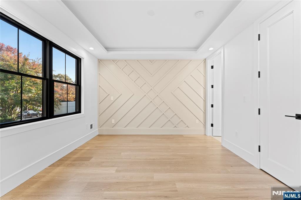 215 Kensington Road River Edge, NJ 07661 - Photo 14 of 37 a view of room with window and hardwood floor