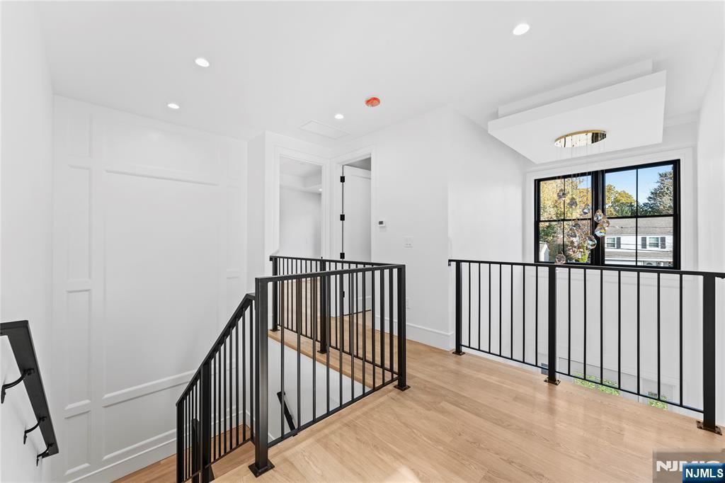 215 Kensington Road River Edge, NJ 07661 - Photo 17 of 37 a view of a hallway with windows