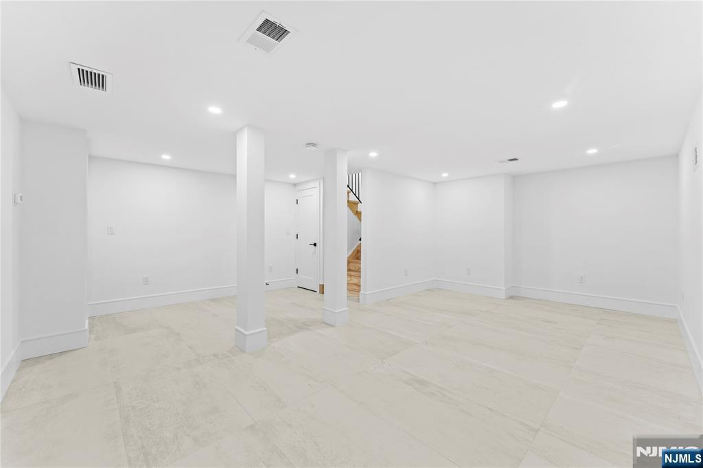 215 Kensington Road River Edge, NJ 07661 - Photo 32 of 37 an empty room with a kitchen