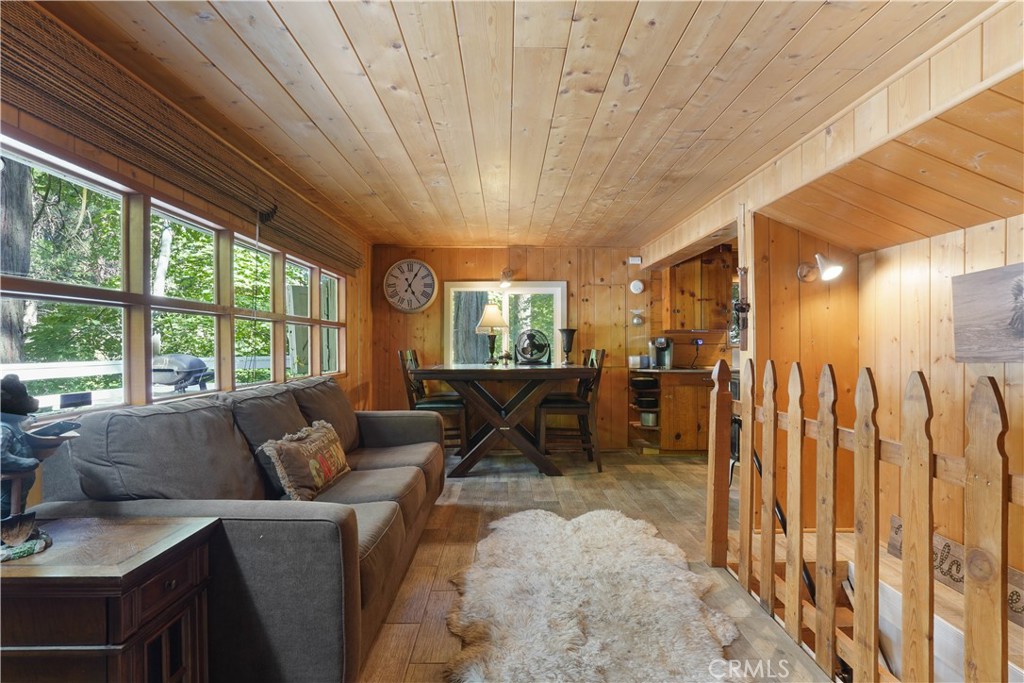 825 Cottage Grove Road Lake Arrowhead, CA 92352 - Photo 5 of 25 a living room with furniture and a large window