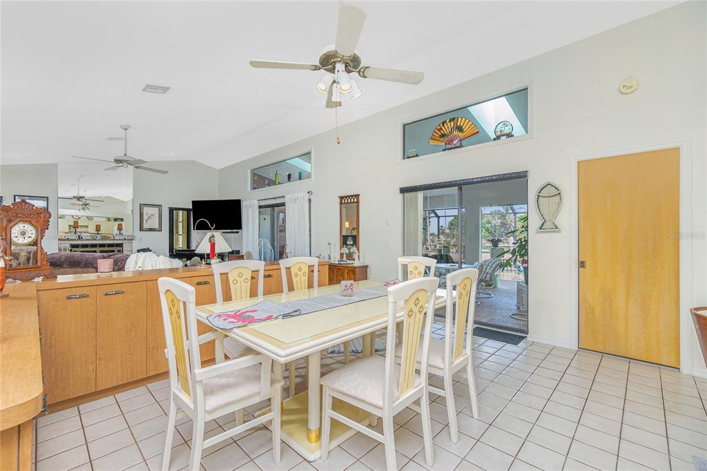 204 Bunker Road Rotonda West, FL 33947 - Photo 14 of 49 a view of a dining room with furniture window and outside view