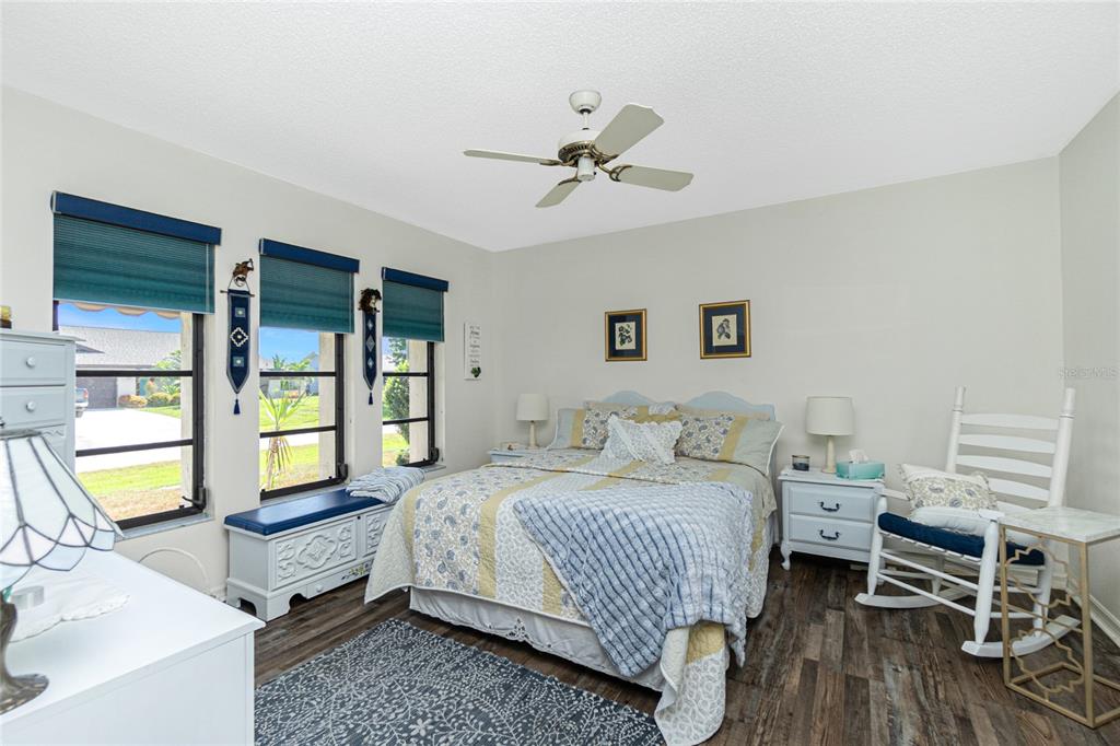 204 Bunker Road Rotonda West, FL 33947 - Photo 23 of 49 a bedroom with a bed and a table