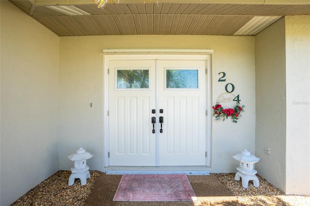 204 Bunker Road Rotonda West, FL 33947 - Photo 3 of 49 a bathroom with a toilet and a shower