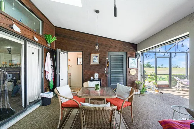 a outdoor space with lots of tables and chairs