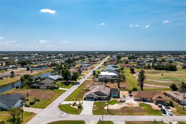 an aerial view of a water and a kitchen