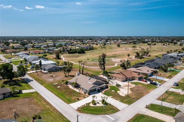 a view of a house with a swimming pool