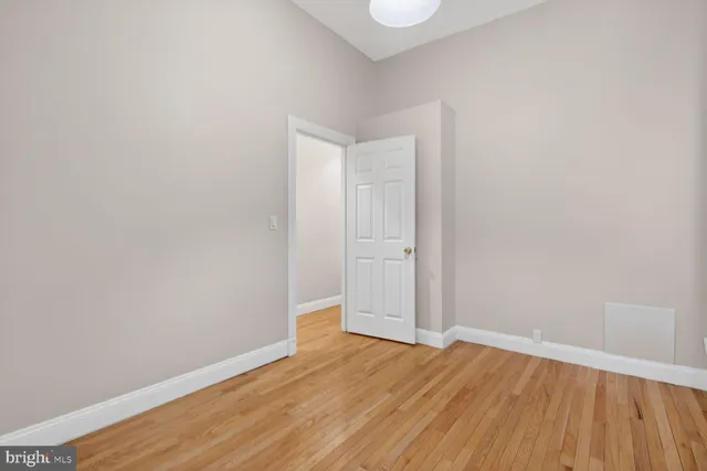 a view of a balcony with wooden floor