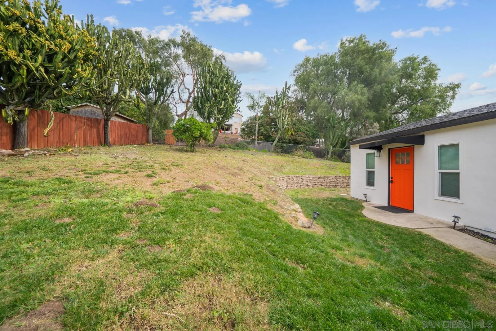 4001 North Bonita Street Spring Valley, CA 91977 - Photo 16 of 31 a backyard of a house with table and chairs