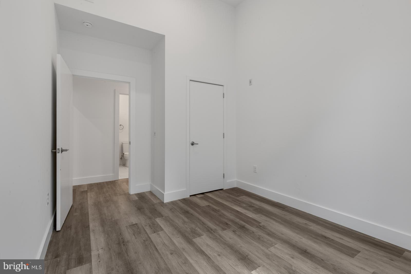 2559 Amber Street, Unit 101 Philadelphia, PA 19125 - Photo 13 of 35 a view of a room with wooden floor