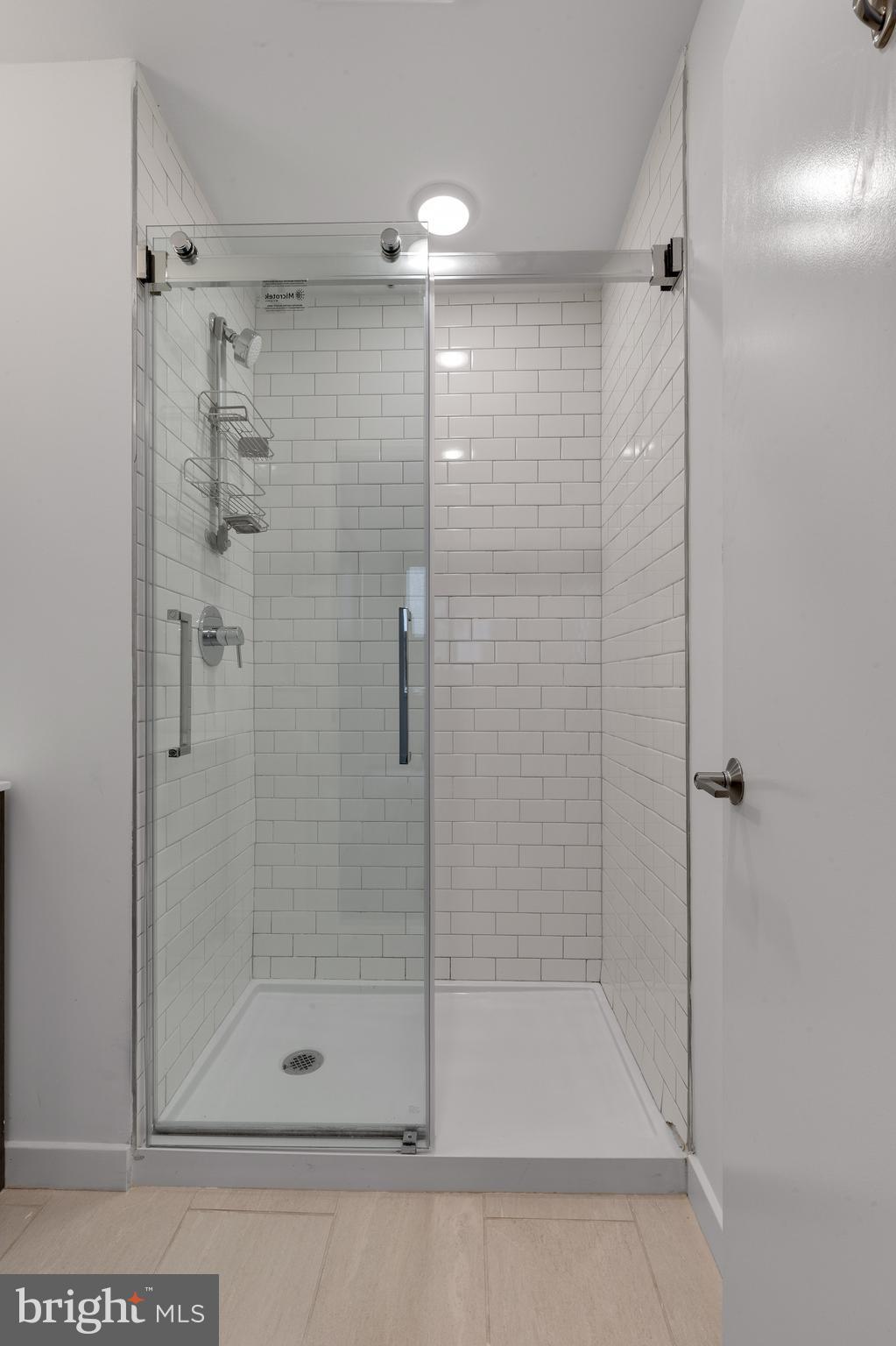 2559 Amber Street, Unit 101 Philadelphia, PA 19125 - Photo 24 of 35 a bathroom with a shower