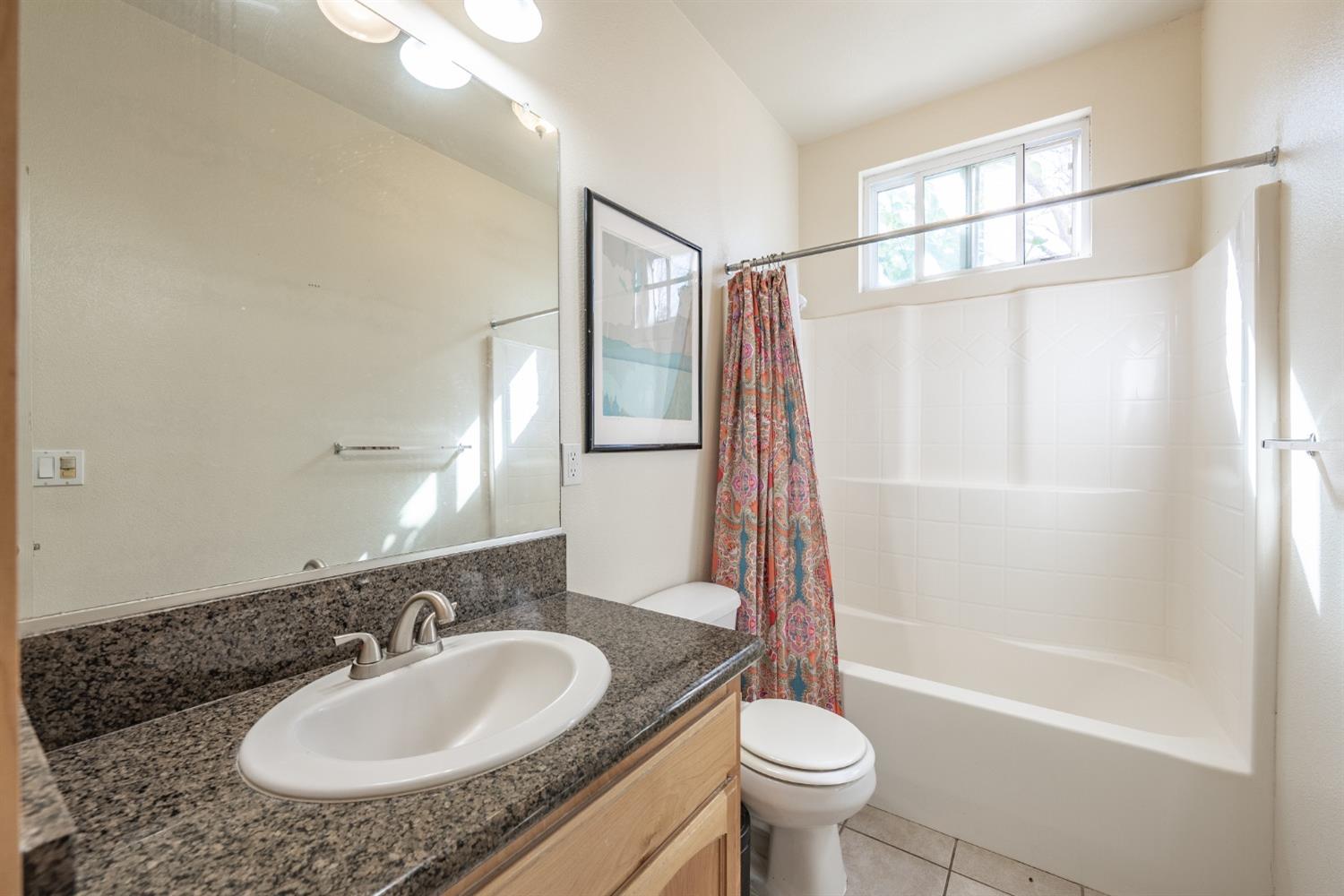 2727 Pear Tree Drive Madera, CA 93637 - Photo 21 of 36 a bathroom with a granite countertop sink toilet and shower