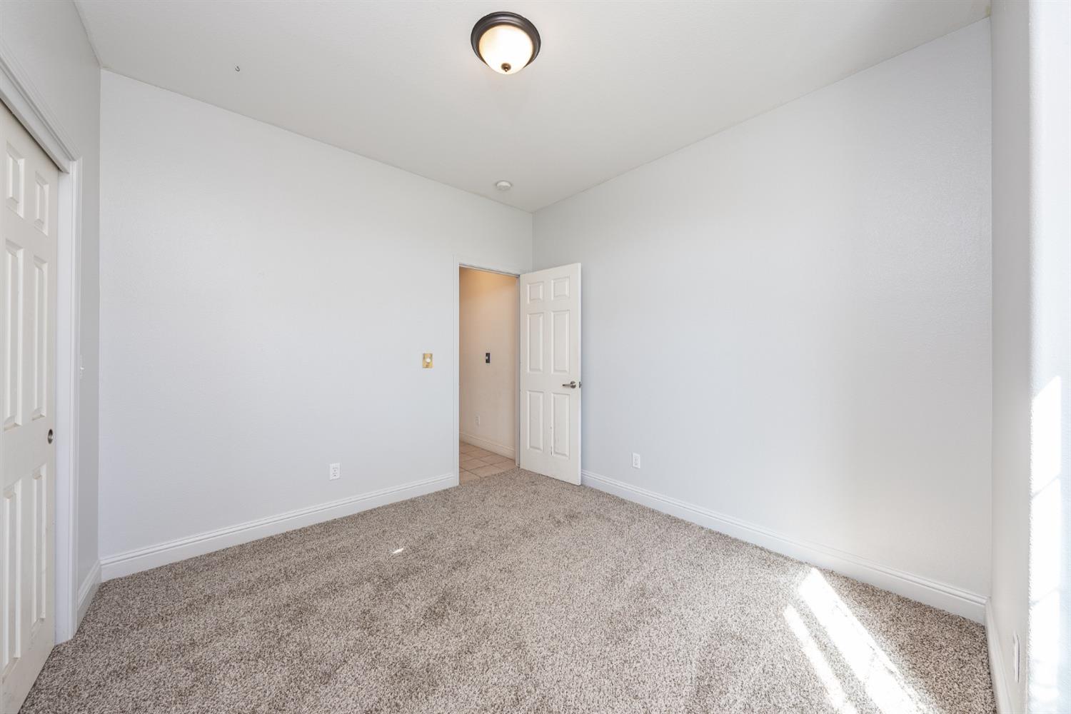 2727 Pear Tree Drive Madera, CA 93637 - Photo 23 of 36 a view of an empty room