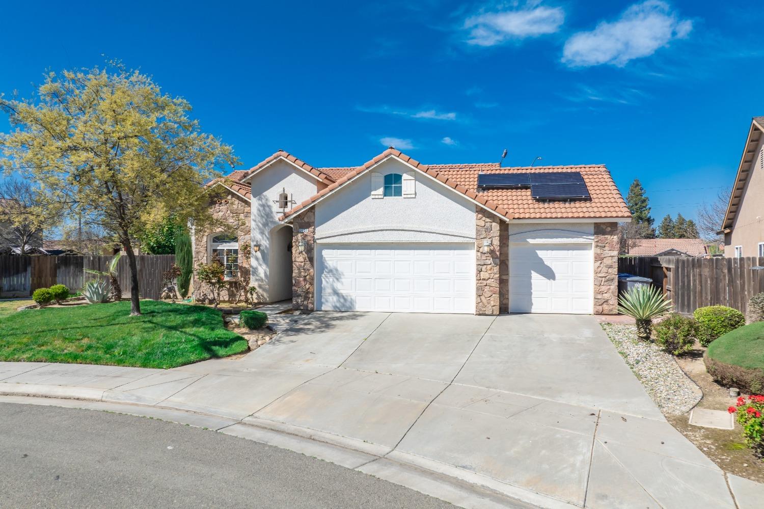2727 Pear Tree Drive Madera, CA 93637 - Photo 31 of 36 a view of a house with a yard