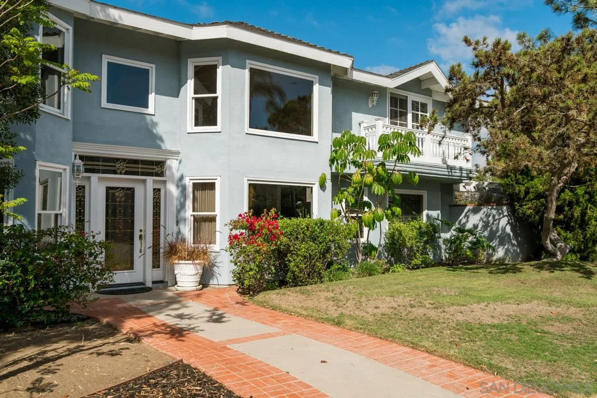 2310 Cordero Road Del Mar, CA 92014 - Photo 2 of 25 a front view of a house with a yard
