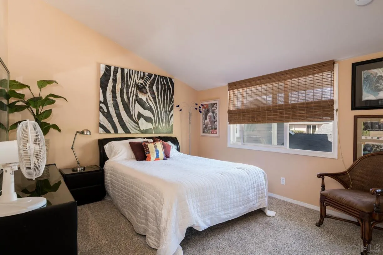 2310 Cordero Road Del Mar, CA 92014 - Photo 22 of 25 a bedroom with a bed and a window