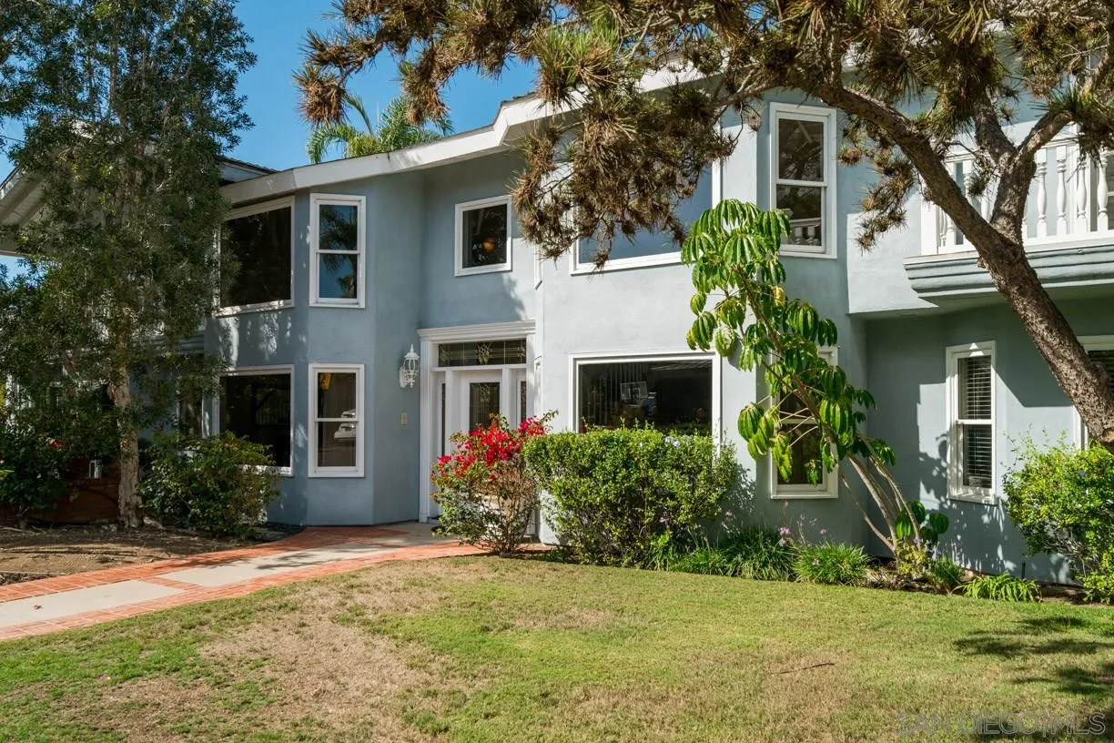 2310 Cordero Road Del Mar, CA 92014 - Photo 3 of 25 a front view of house with yard and trees