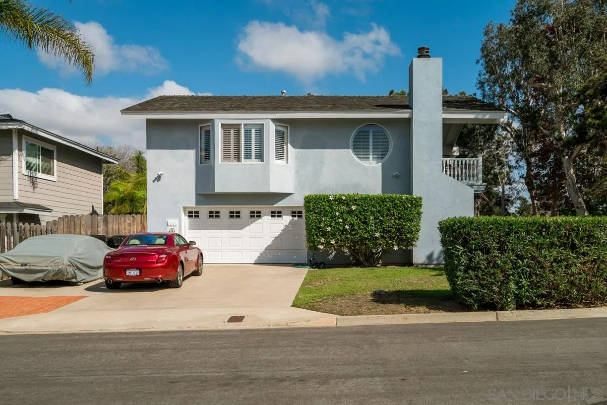 2310 Cordero Road Del Mar, CA 92014 - Photo 4 of 25 a front view of a house with a garden