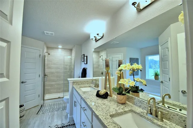 a bathroom with a tub and a sink
