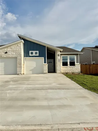 a view of a house with a patio