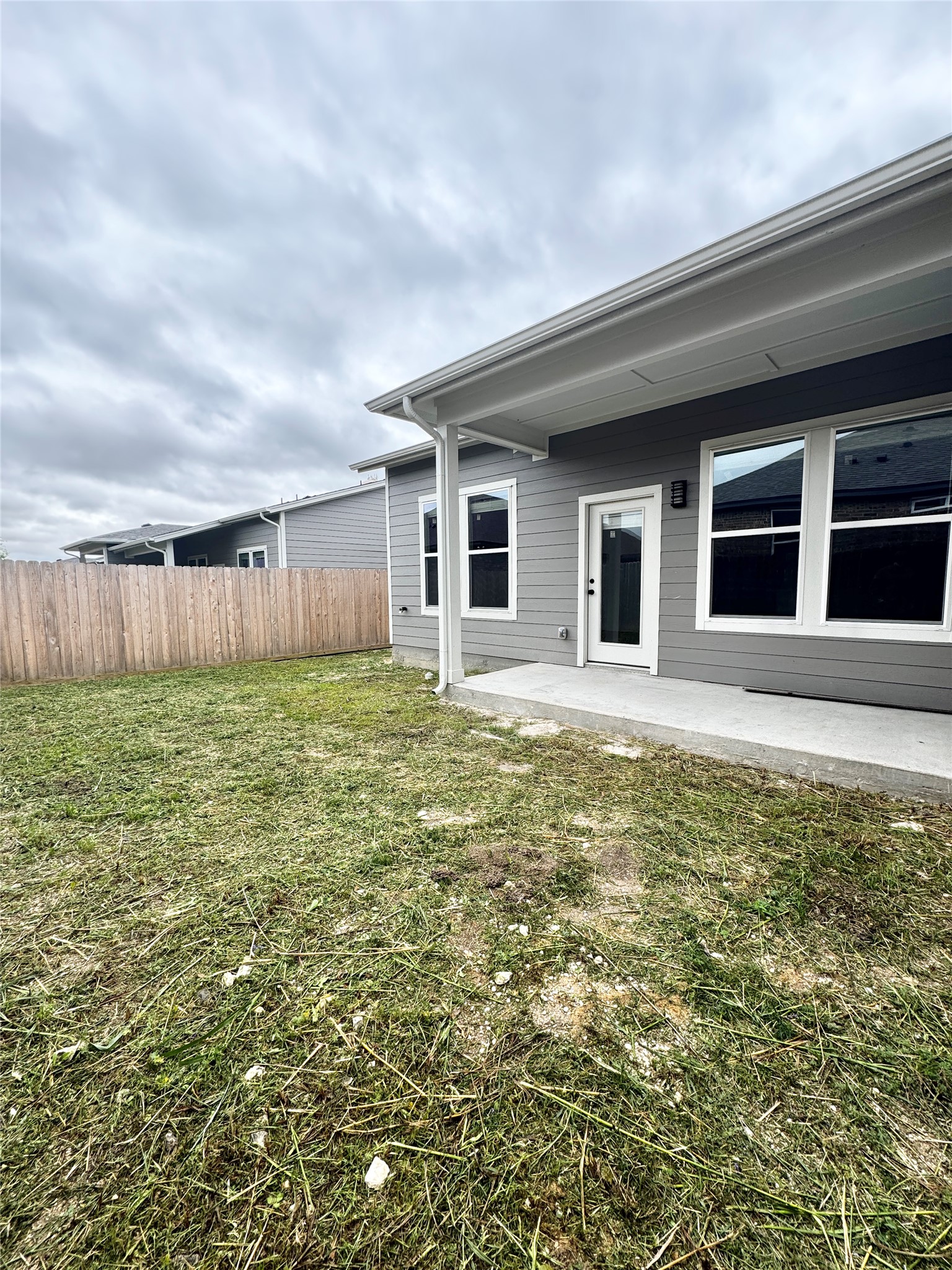 108 Zayd Court, Unit B Jarrell, TX 76537 - Photo 21 of 21 a front view of a house with garden
