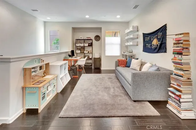 a living room with furniture and a couch