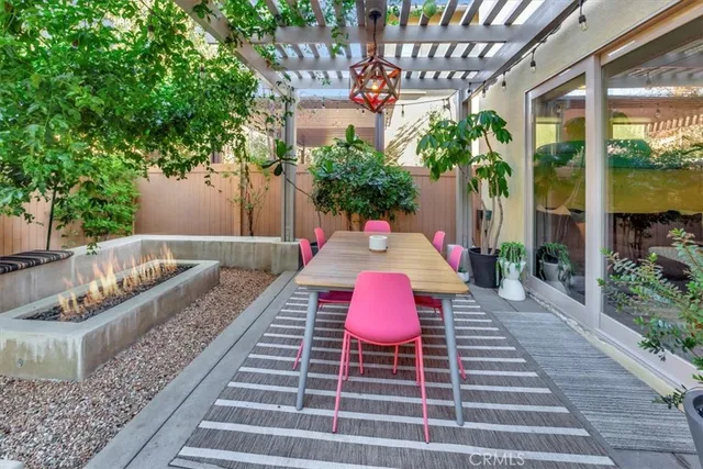 a swimming pool with outdoor seating