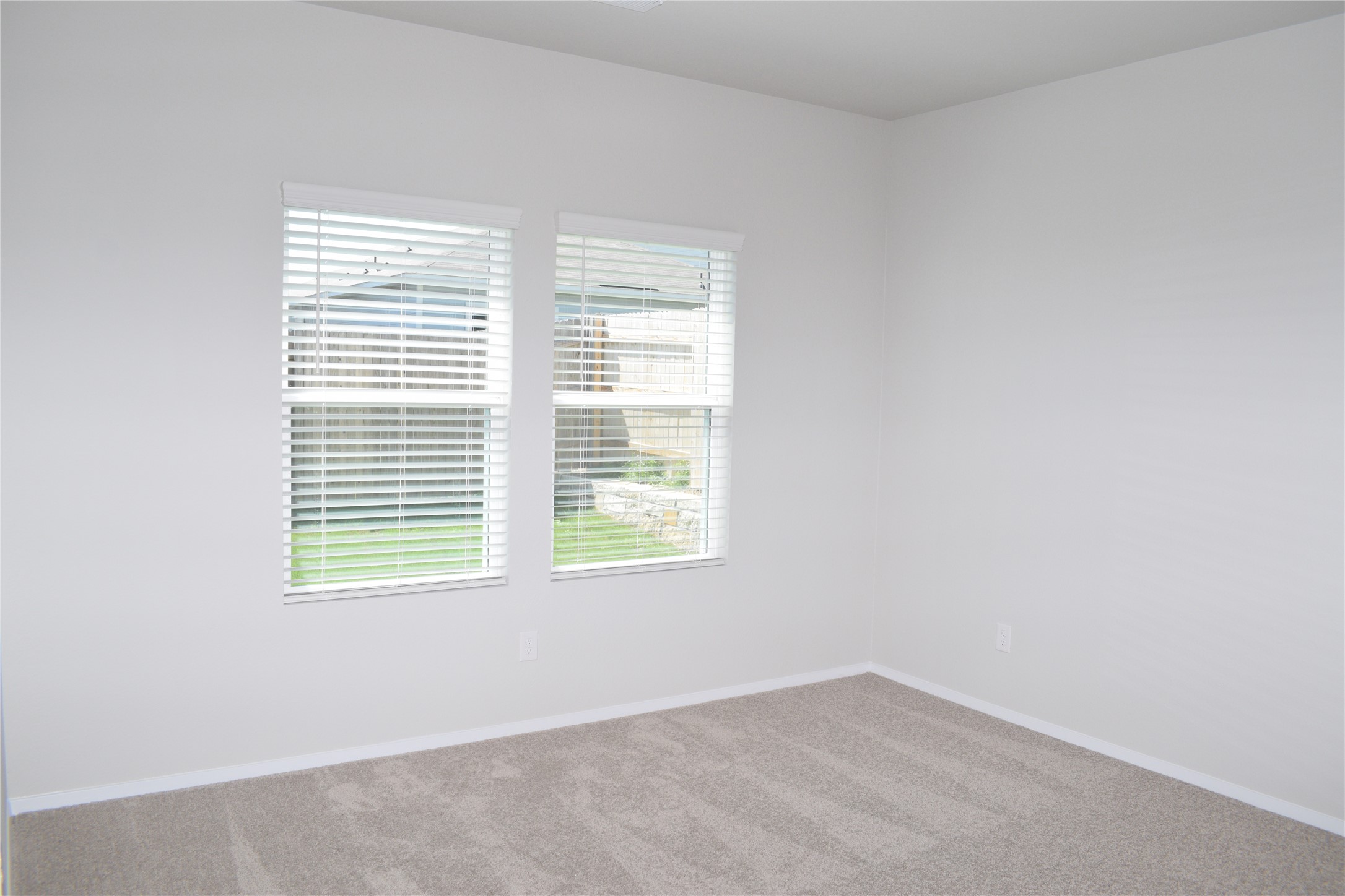 2705 Towy Road Manor, TX 78653 - Photo 10 of 30 Carpeted spare room with baseboards