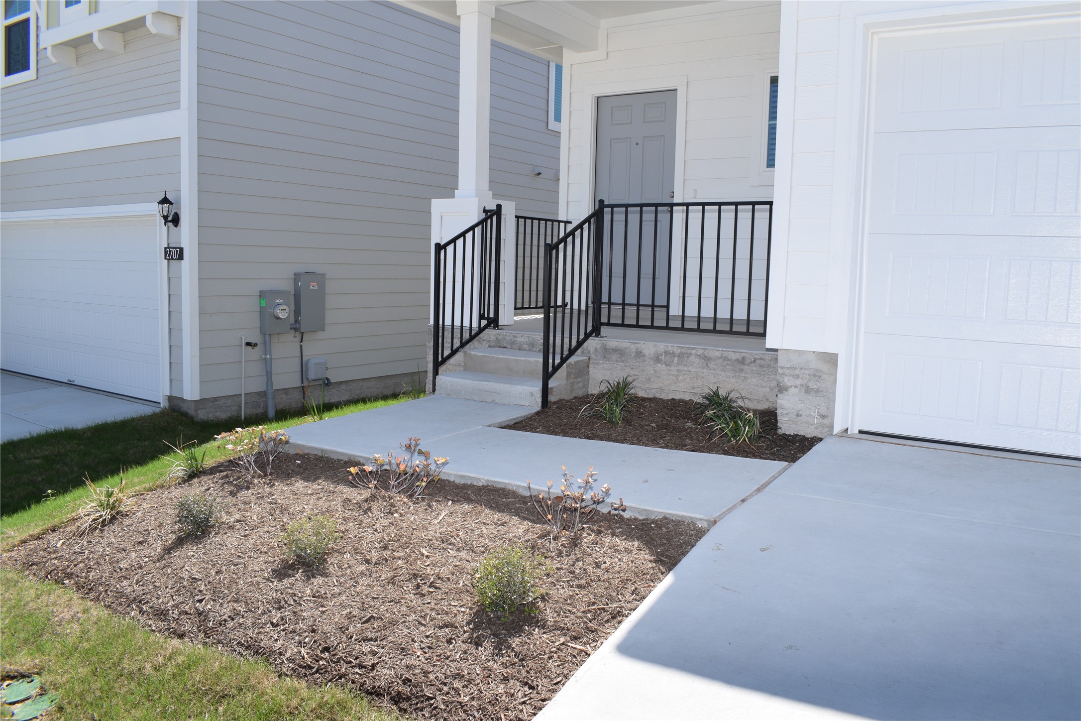 2705 Towy Road Manor, TX 78653 - Photo 3 of 30 View of exterior entry with a porch and driveway