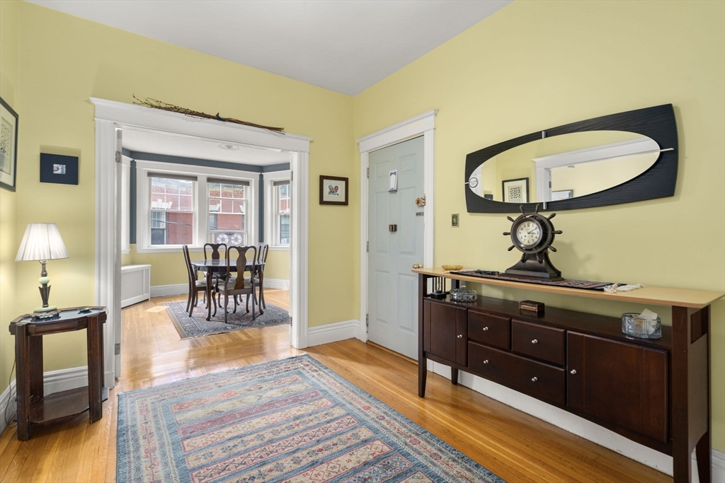 5 Colliston Road, Unit 54 Boston, MA 02135 - Photo 3 of 18 a view of a workspace room with wooden floor