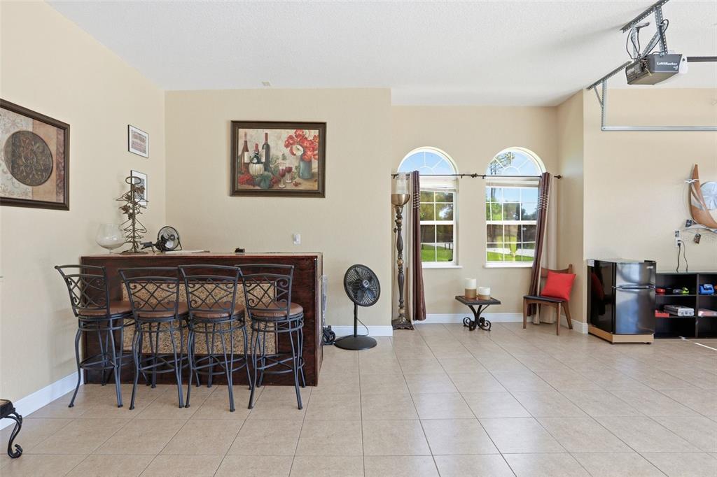 13429 Montevista Road Clermont, FL 34711 - Photo 60 of 89 a view of a livingroom with furniture and a window