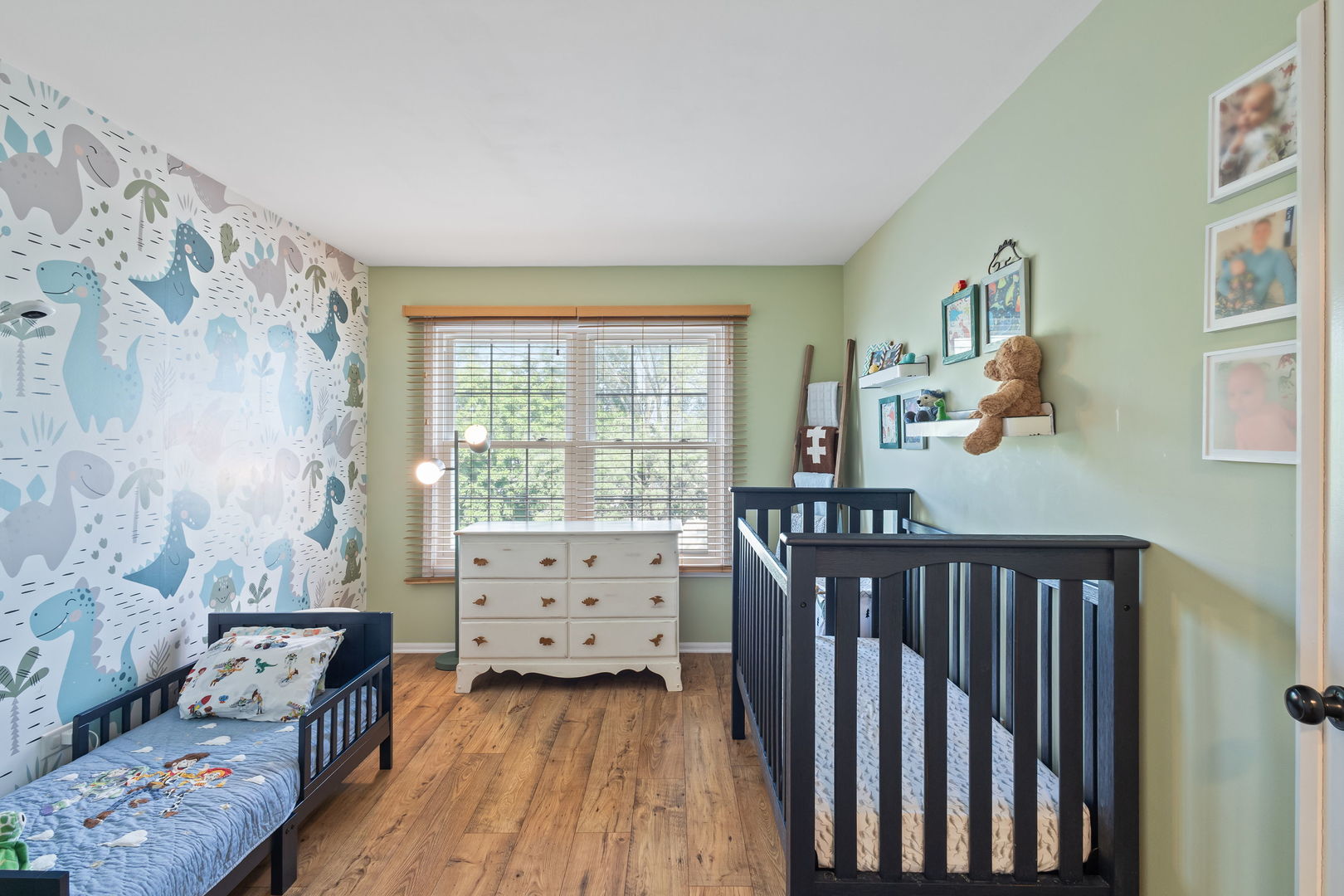 9702 Chelsea Place Mokena, IL 60448 - Photo 14 of 20 a bedroom with furniture and baby crib