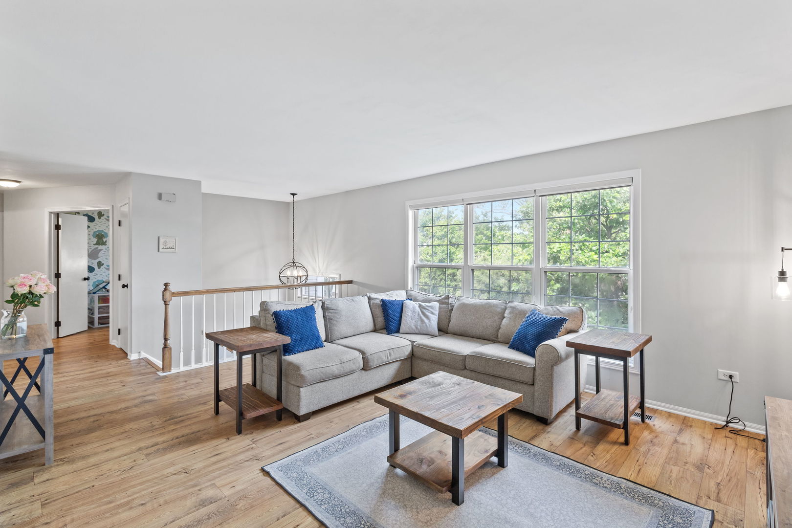 9702 Chelsea Place Mokena, IL 60448 - Photo 2 of 20 a living room with furniture and a window