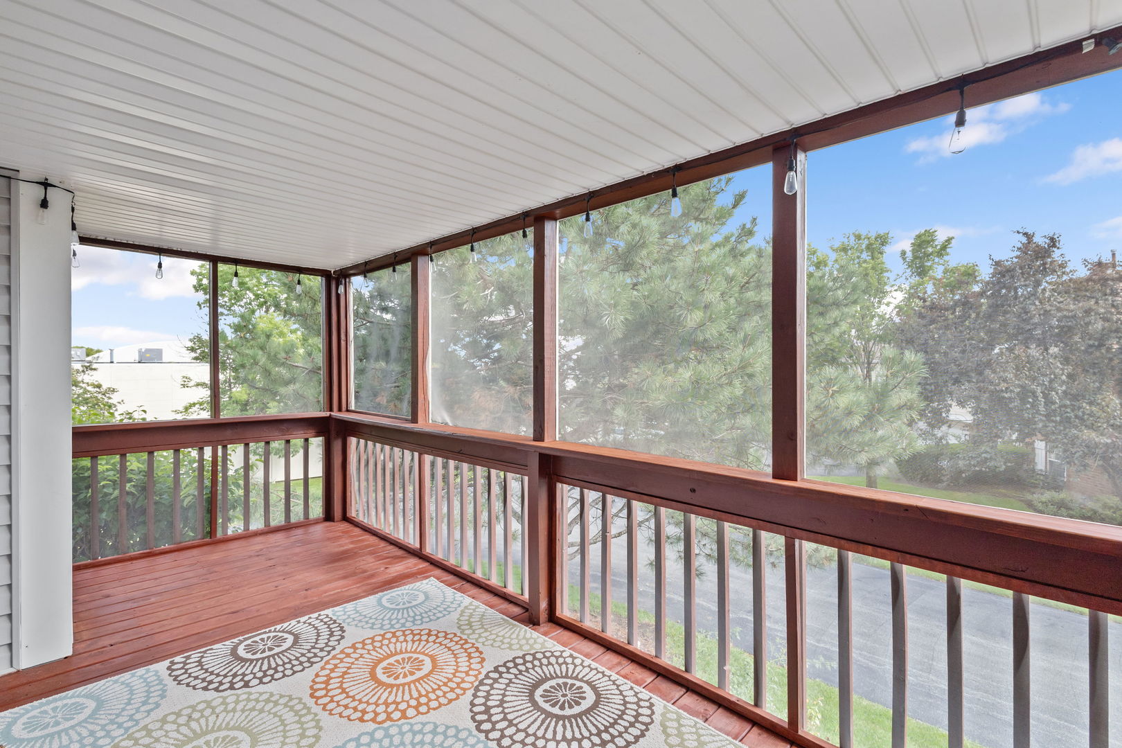 9702 Chelsea Place Mokena, IL 60448 - Photo 8 of 20 a view of a balcony with wooden floor