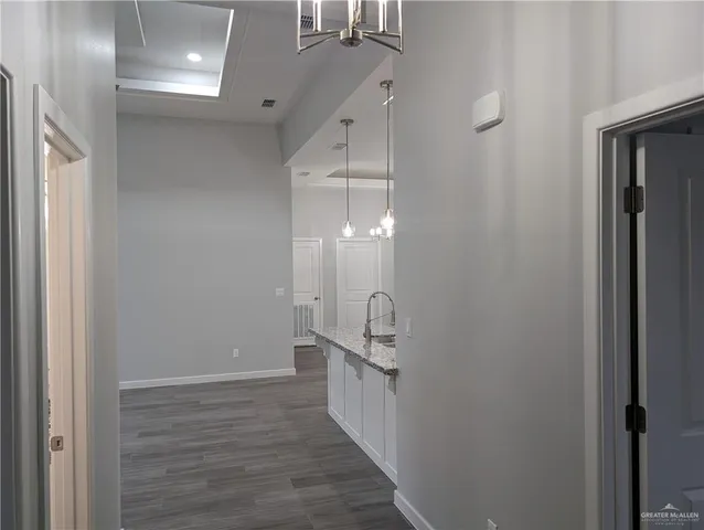 a bathroom with a double vanity sink and mirror