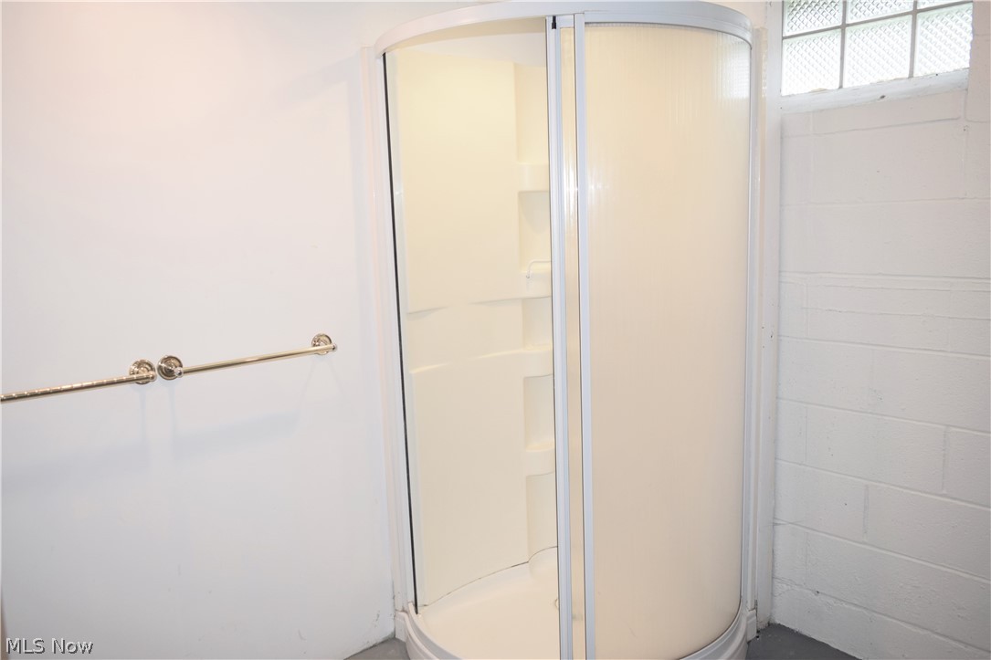 6510 Annandale Road Cleveland, OH 44124 - Photo 17 of 21 An extra shower stall in the basement is great for a quick rinse off for humans and furry friends on a muddy day!