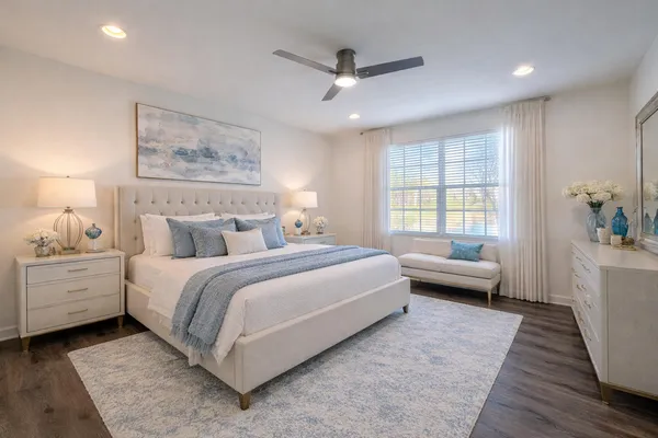 a bed room with bed and window