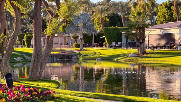 a view of a two chairs in the deck