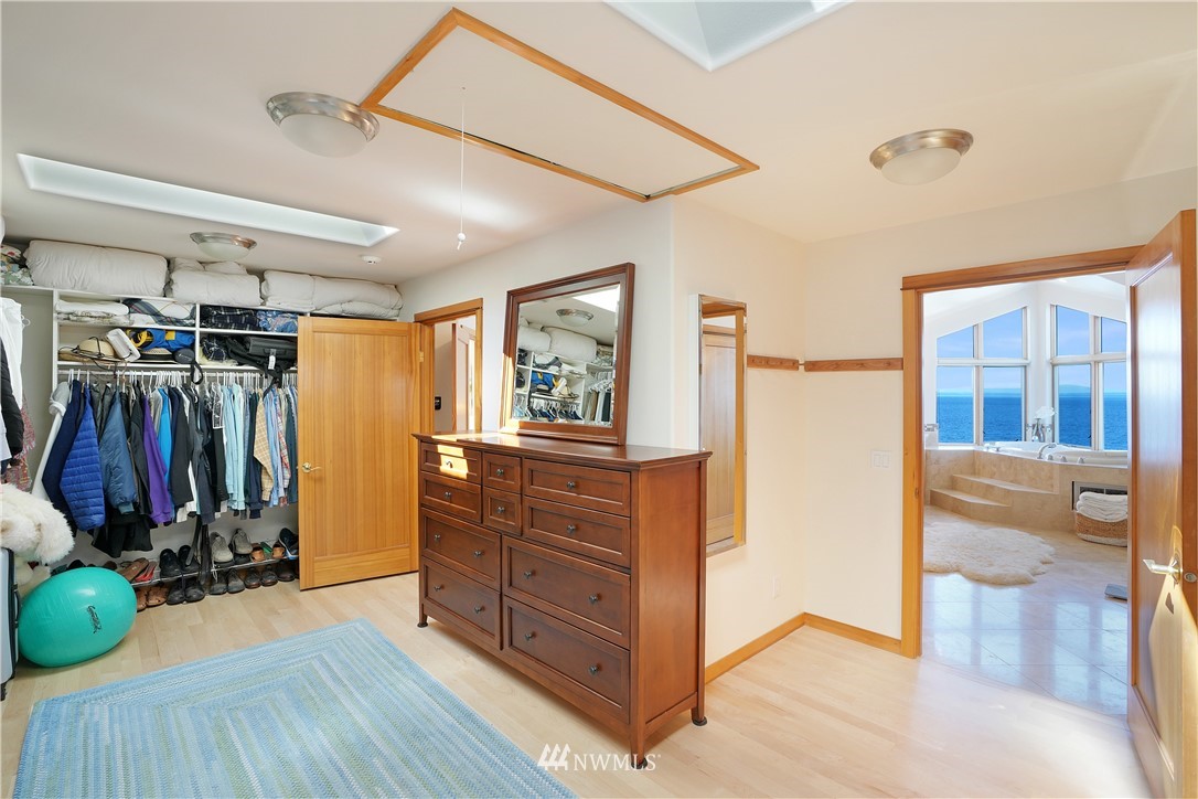 4844 G Loop Bow, WA 98232 - Photo 29 of 40 a view of a walk in closet with clothes and shoes