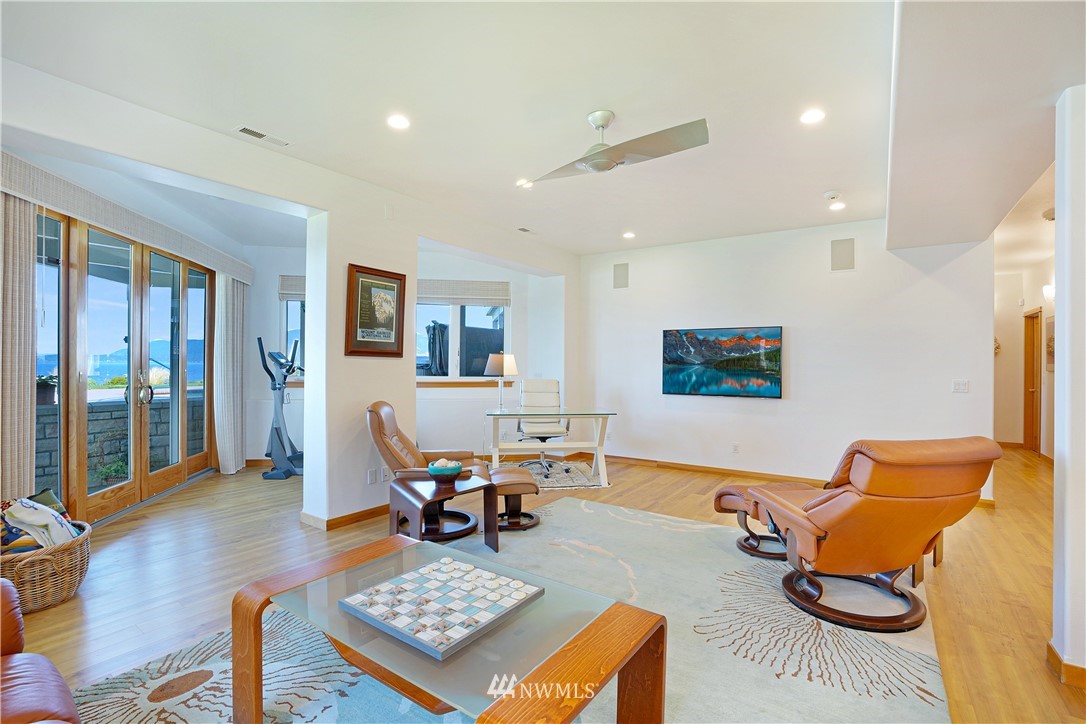 4844 G Loop Bow, WA 98232 - Photo 32 of 40 a living room with furniture a rug and a table
