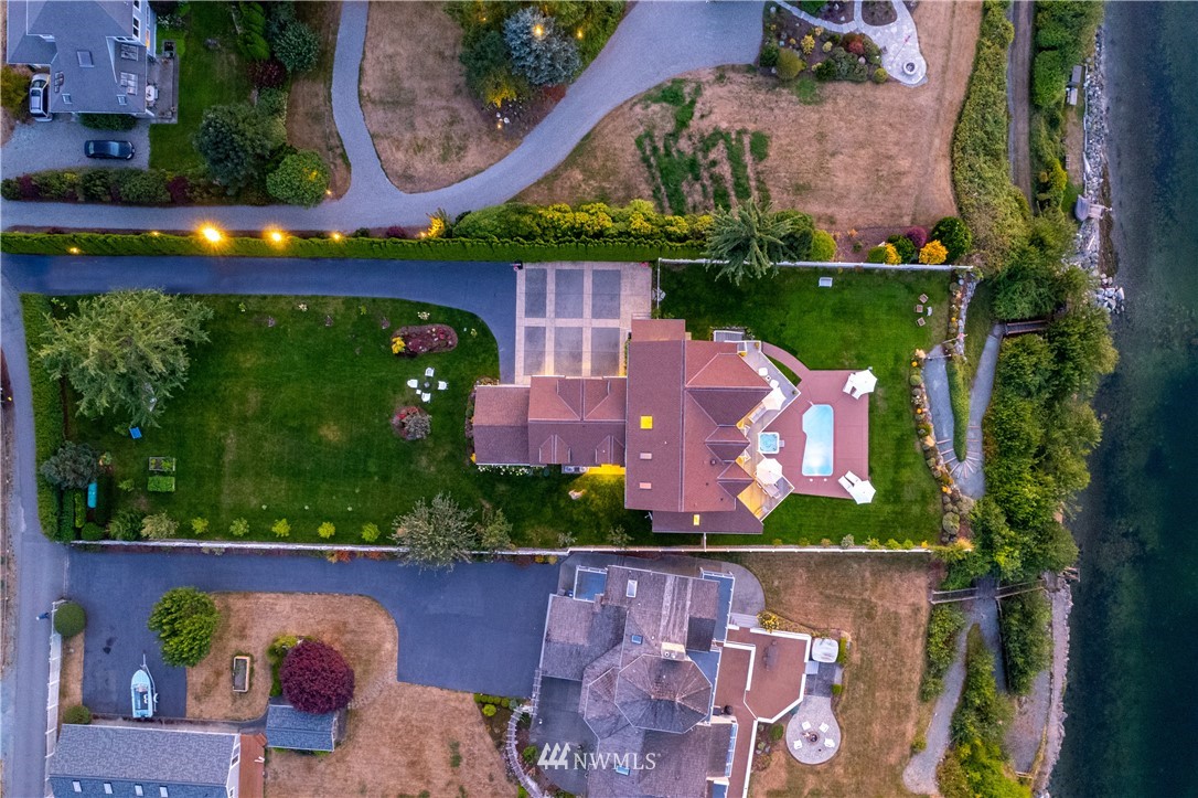 4844 G Loop Bow, WA 98232 - Photo 38 of 40 an aerial view of a house with a garden and yard