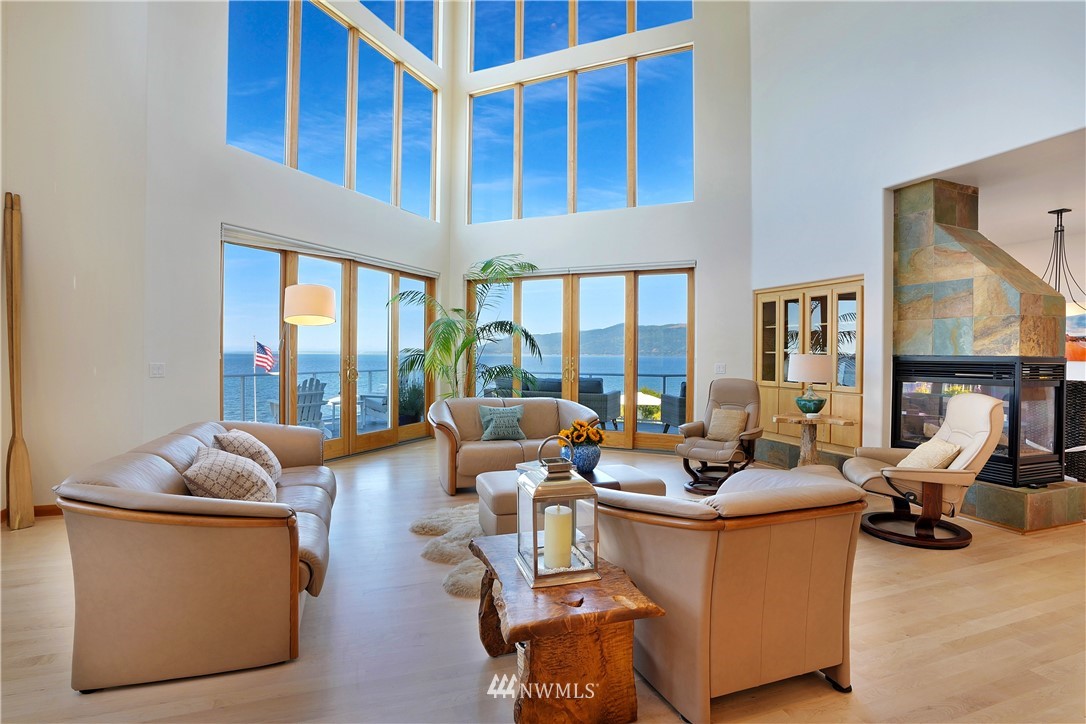 4844 G Loop Bow, WA 98232 - Photo 8 of 40 a living room with furniture gym equipment and a large window
