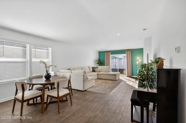 a view of a livingroom with furniture and window