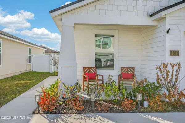 a house view with a garden space