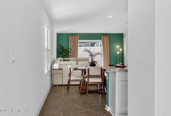 a room with furniture and a large window