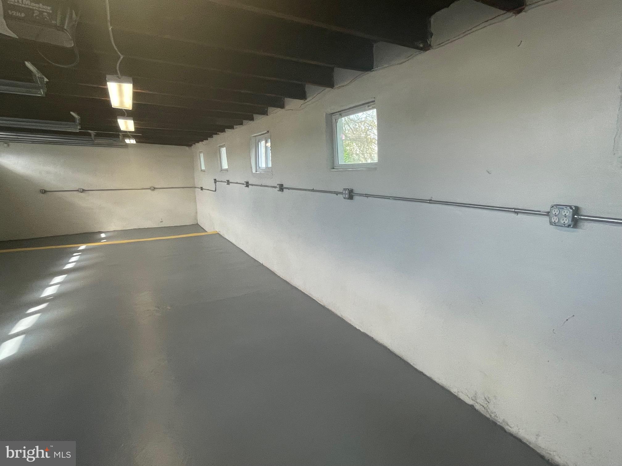 132 Maple Street, Unit GARAGE Conshohocken, PA 19428 - Photo 3 of 5 a view of a room with an empty space