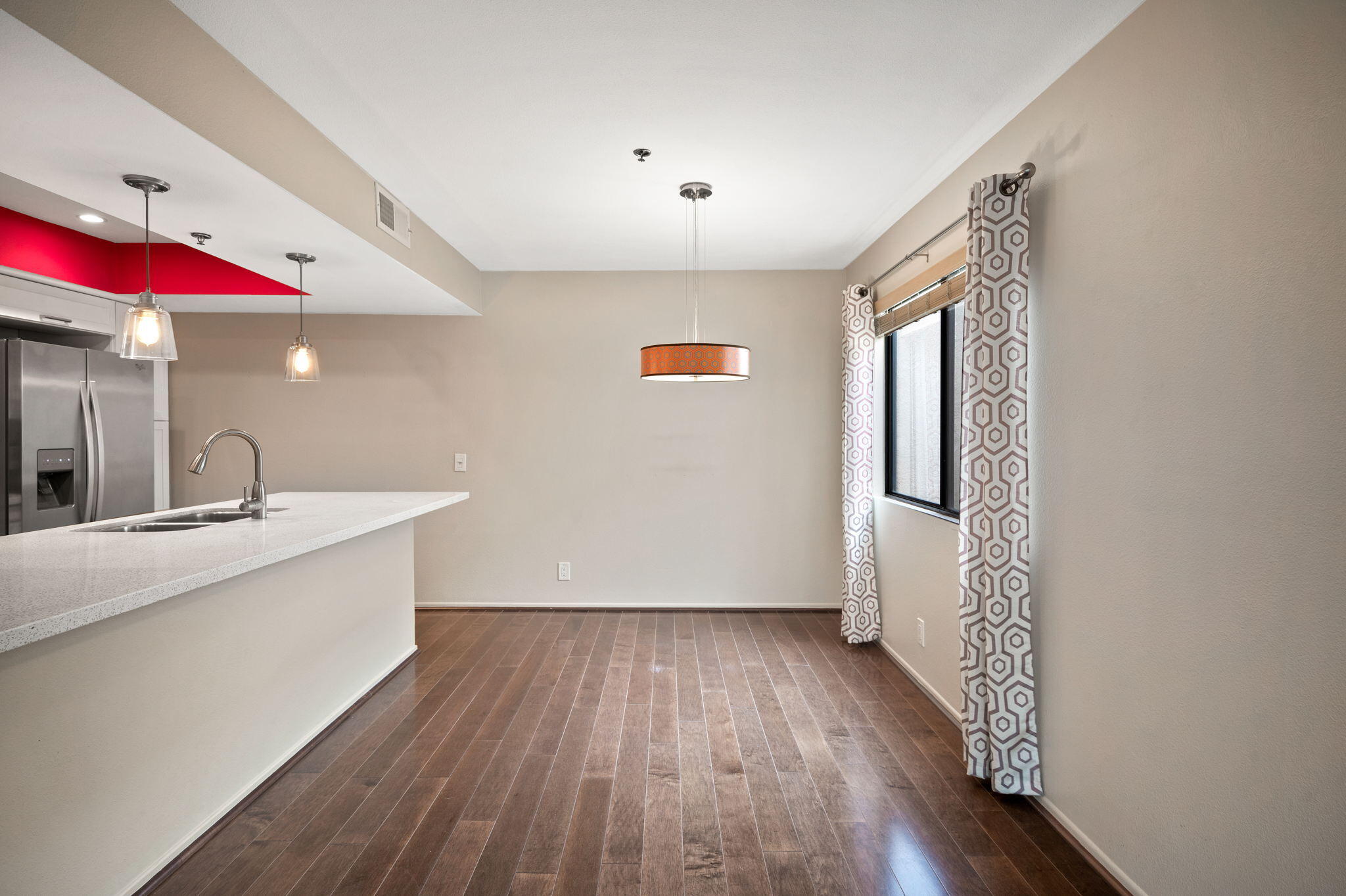 200 East Racquet Club Road, Unit 52 Palm Springs, CA 92262 - Photo 7 of 23 a very nice looking room with wooden floor and a window