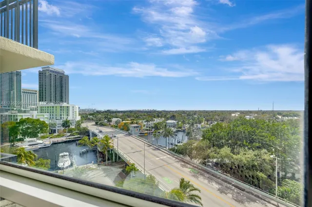 a view of a balcony with city view