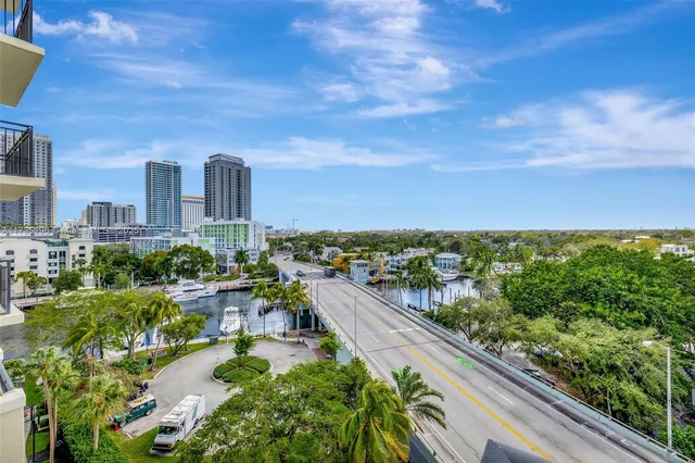 a bathroom with a granite countertop sink mirror and bathtub
