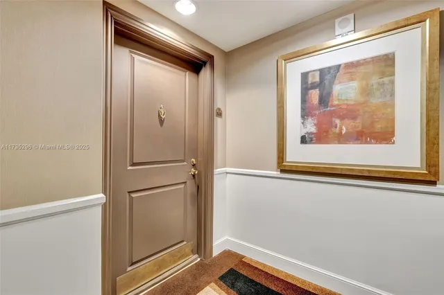 a view of a small space with wooden floor